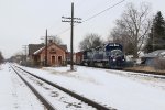 Making their slow crawl through town, 6305 & 6304 roll past the depot with Z127